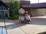 Tim with the wine barrels. The cache was actually behind a bench.