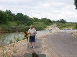Tim checks the coordinates on the banks of the Pedernales River.