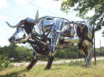 vacationday4-017 This sculpture was outside of Johnson City. There is a sculpters compound down the road and a cache close to the bull.